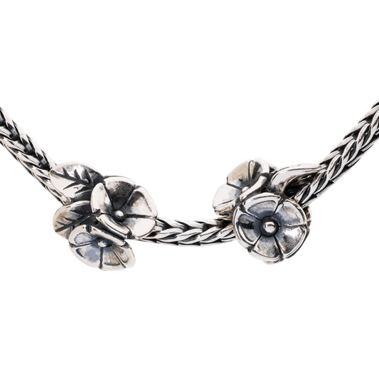 Ciondolo Trollbeads L'Abbraccio dei Fiori TAGPE-00015